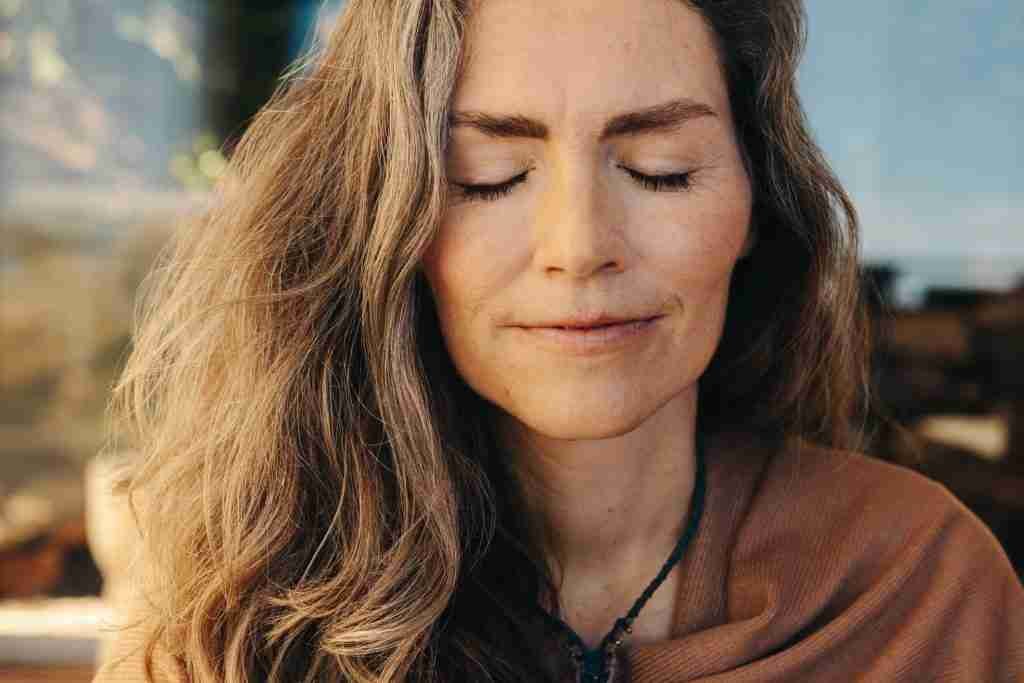 A lady doing meditation