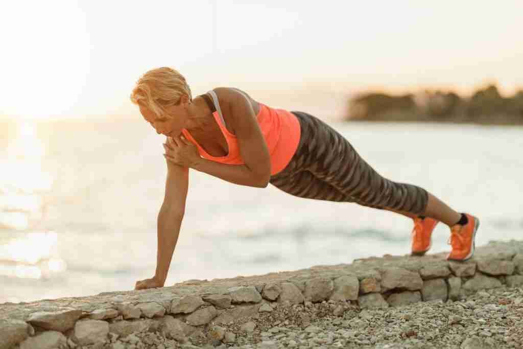 Lady going plank exercise