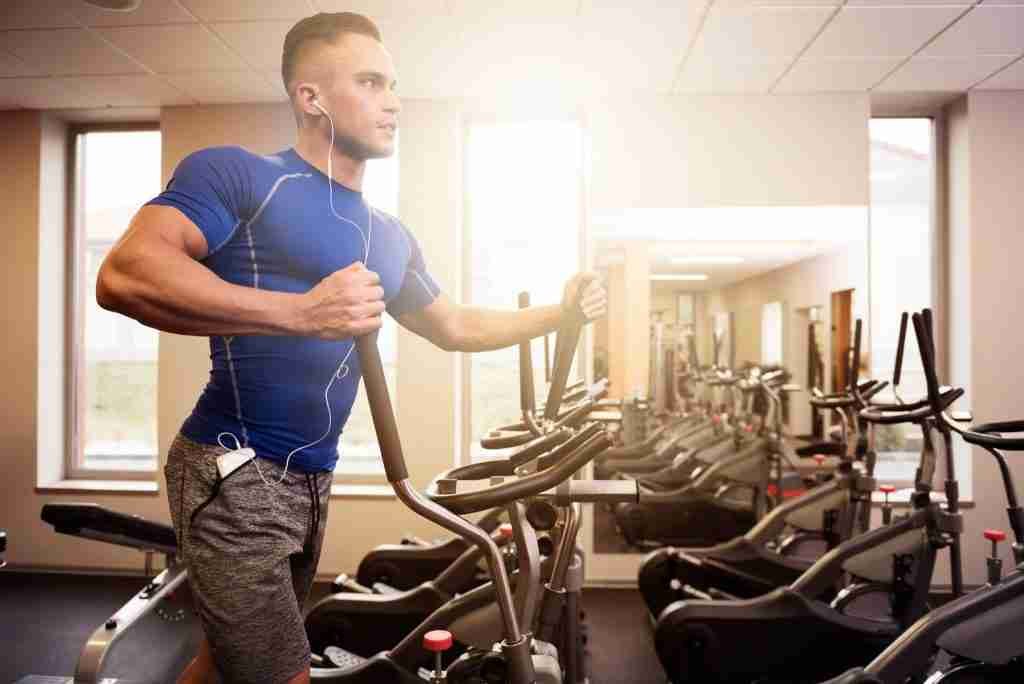 A man on elliptical trainer