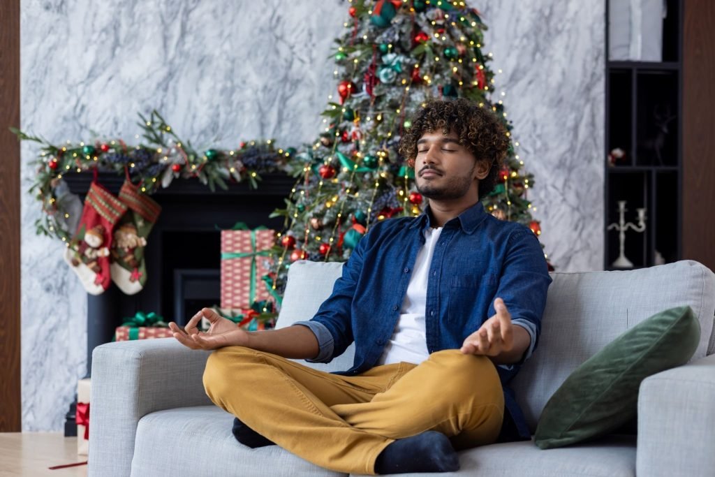 Christmas young man meditating 